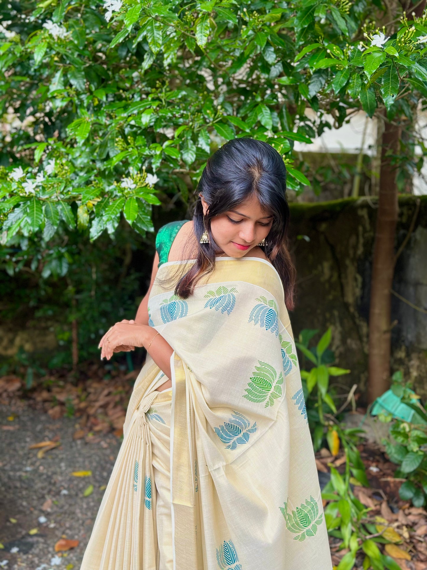 Lotus Printed Golden Tissue Saree – Elegant Traditional Wear for Women