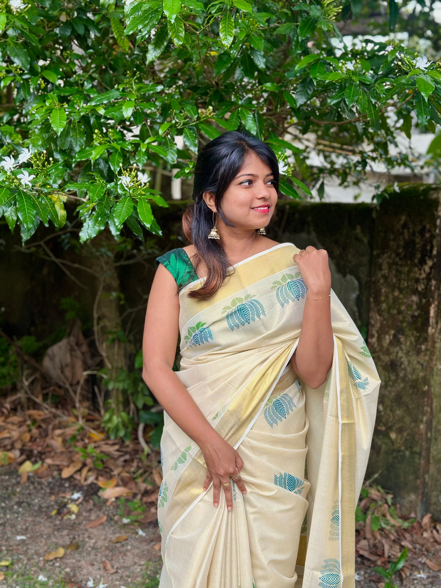 Lotus Printed Golden Tissue Saree – Elegant Traditional Wear for Women